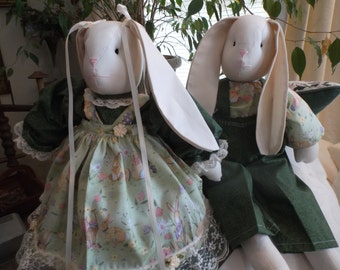 A   Easter Boy and Girl Stuffed   Bunny with designs of Bunnies on Their Outfits