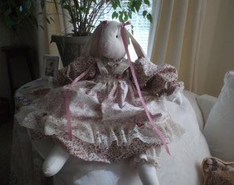 Beautiful Bunny Rabbit With a Plum Color Dress and a Toile Pinafore to Match