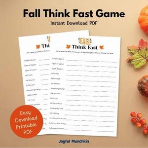 Könnte beinhalten: Zwei weiße, bedruckbare Spielblätter mit dem Titel "Fall Think Fast Game" mit Herbstthema. Die Blätter haben Ausfüllfelder für verschiedene herbstbezogene Kategorien. Ein orangefarbener Kreis mit dem Text "Easy Download Printable PDF" befindet sich unten links.