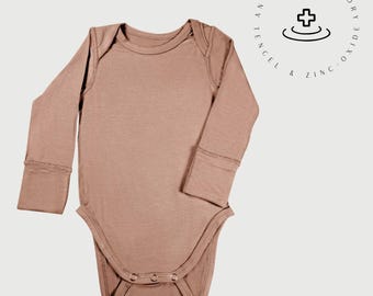 Body de manga larga para bebé: tejido Tencel con óxido de zinc para pieles sensibles.