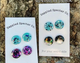 2 Pair GLOW Moon and Stars Stud Earrings with Pink Glitter OR Black Iridescent - Glow- UV Reactive Jewelry, Earrings- Resin/Stainless Steel