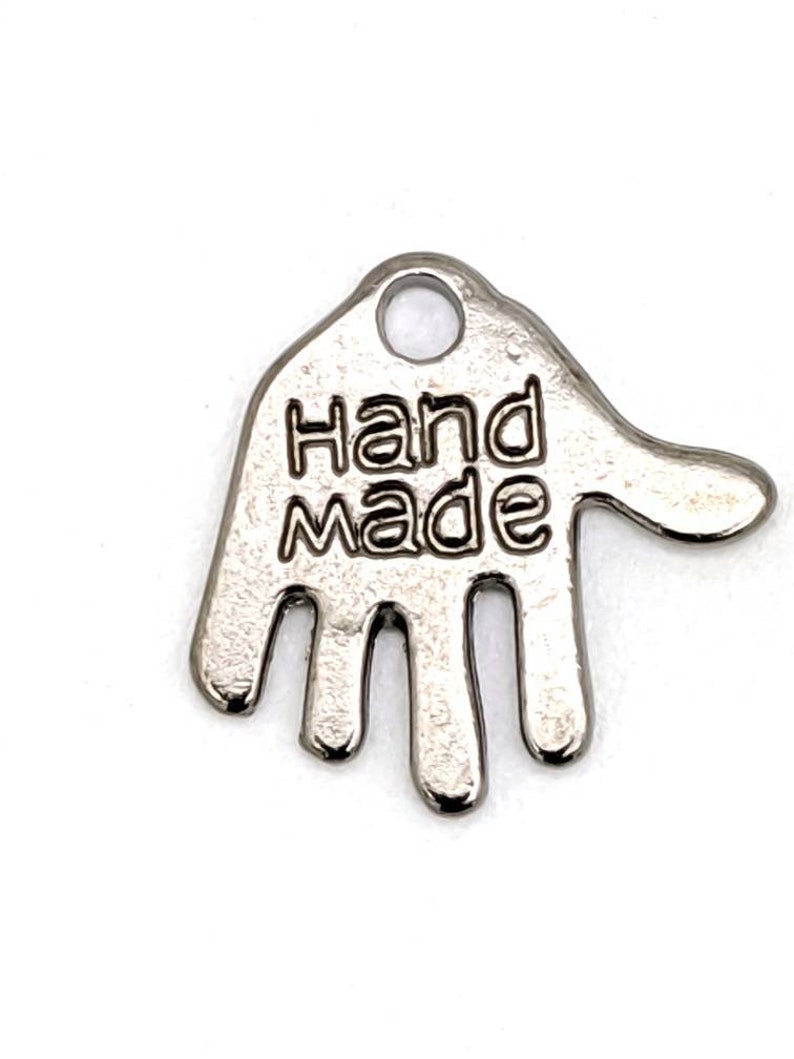 Cute silver hand charms for jewelry making. Tiny hand shaped Etsy