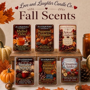May include: Six clear plastic clamshell packages of soy wax melts labeled Love and Laughter Candle Co. Fall Scents. The labels feature images of Mulled Cider, Peppered Pumpkin, Spiced Cranberry, Sweater Season, Autumn Flannel, and Cinnamon Apples.