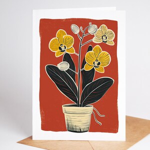 Orchid folk art note card with yellow blooms on a deep red background