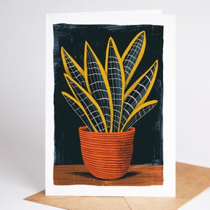 Snake plant folk art note card in a terracotta pot on a navy background