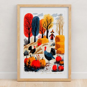Pumpkin patch folk art print with turkeys, hay bales and a scarecrow, framed in light oak