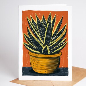 Zebra succulent folk art note card in a yellow pot on an orange background