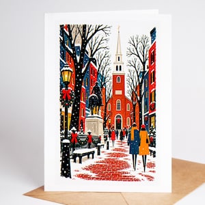 Boston Christmas card standing with envelope, the white spire of the Old North Church above snowy rooftops