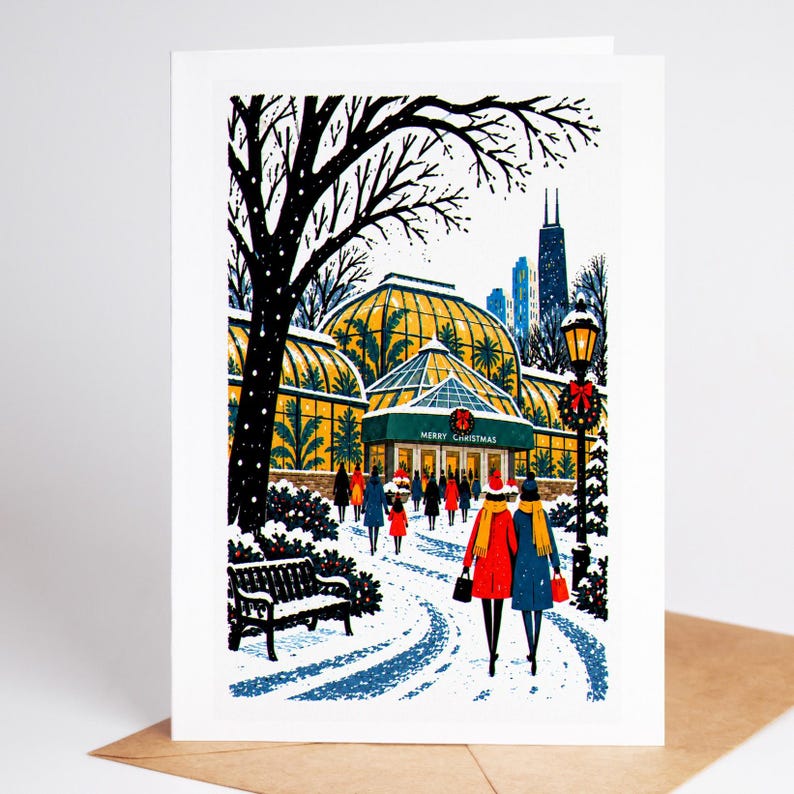 Chicago Christmas card standing upright, the glass houses of the Lincoln Park Conservatory glowing in the snow