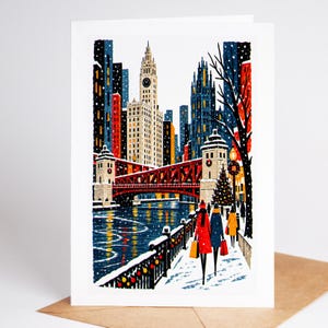 Chicago Christmas card standing with envelope, the Chicago River bridges and skyline under falling snow