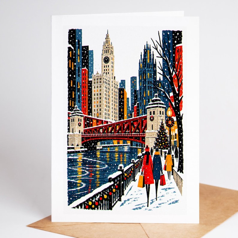 Chicago Christmas card standing with envelope, the Chicago River bridges and skyline under falling snow