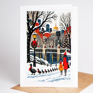 Boston Christmas card standing upright, the Public Garden footbridge and lagoon in the snow
