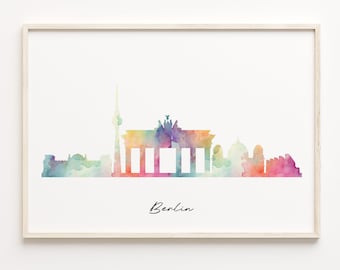 May include: A watercolor painting of the Berlin skyline, featuring the Brandenburg Gate and the Fernsehturm. The painting is in a light wood frame and has a white background. The text "Berlin" is written in black cursive at the bottom of the painting.