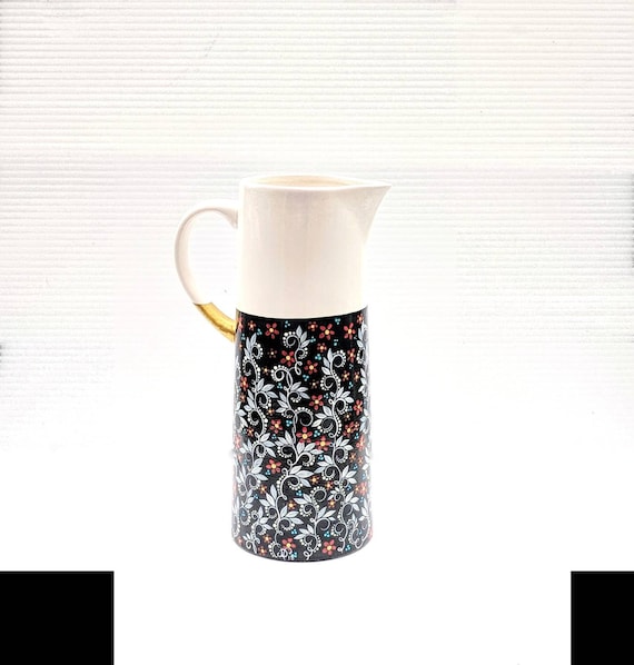 Pitcher: hand painted ceramic pitcher or vase