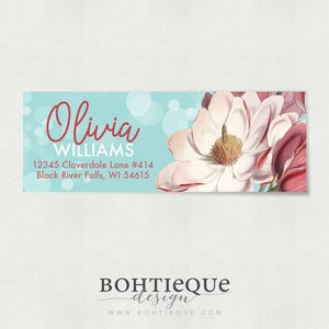 May include: A light blue return address label with a white magnolia flower and the text "Olivia WILLIAMS 12345 Cloverdale Lane #414 Black River Falls, WI 54615" in red.