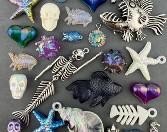 A Deep Sea Gothic Collection of Charms, Beads, and Miniature Trinkets