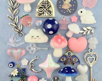 A Cottage Collection of Fairy Charms and Beads with fairy door that opens
