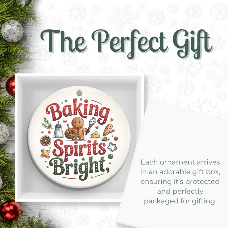 May include: A round, white Christmas ornament with the text "Baking Spirits Bright" in red and green. The ornament features illustrations of baking tools and a gingerbread man. The ornament is presented in a white gift box.