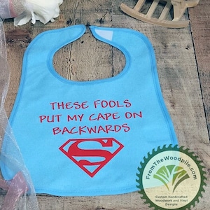 These Fools Put My Cape On Backwards Bib