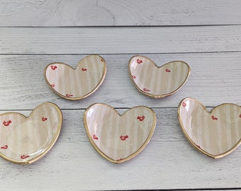 Handmade ceramic hearts with cardinals and birch trees