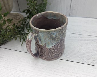 Lavender mug with floral texture
