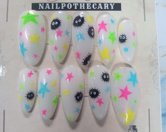 Estrellas confitadas / Uñas de hollín / Uñas postizas