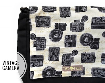 Bolso bandolera vintage retro para tabletas, libros y portátiles con diseño de cámaras.