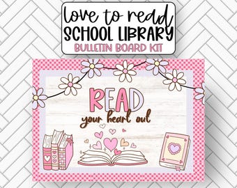 May include: A pink and white bulletin board kit with the text "love to read SCHOOL LIBRARY BULLETIN BOARD KIT". The main image features a white wood background with the text "READ your heart out" in pink and purple letters. There are pink and white hearts and a stack of books with hearts on the covers.