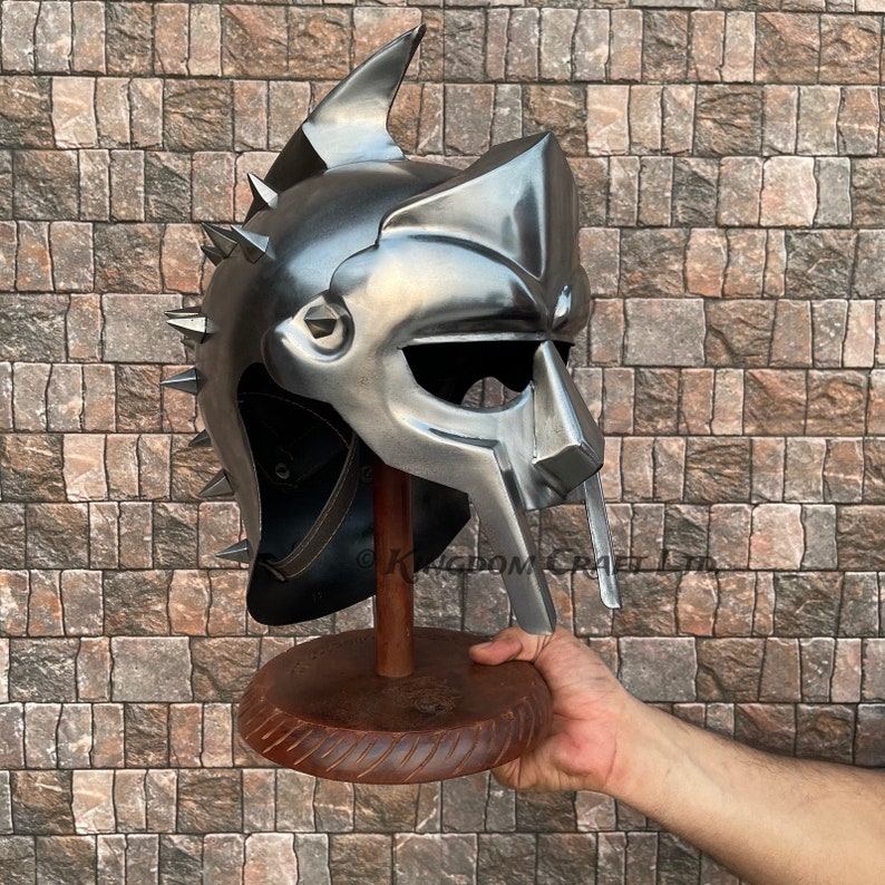 Maximus Gladiator Helmet Russell Crowe Helmet for Cosplay Prop Gladiator Experience the feel of a warrior by wearing this Maximus Gladiator helmet Inspired by the iconic helmet worn by Russell Crowe in the popular movie Gladiator.