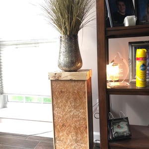 Display pedestal for vases, statues and statement pieces