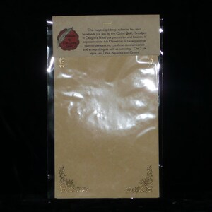 May include: A golden parchment with a decorative border, packaged in a clear plastic bag. The parchment has text that reads: "This magical golden parchment has been handmade for you by the Gilded Quill. Smudged in Oxapon's Blood for protection and balance, it represents the Air Elemental. This is good for faceted perspective, excellent communication and storytelling as well as curiosity. The 3 air signs are: Libra, Aquarius and Gemini."
