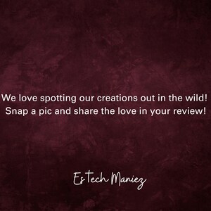 May include: A burgundy textured background with white text that reads "We love spotting our creations out in the wild! Snap a pic and share the love in your review! Estech Maniez"