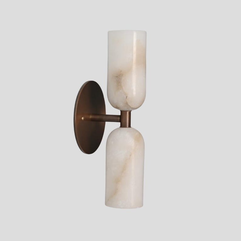 2 light alabaster wall sconce in antique brass finish