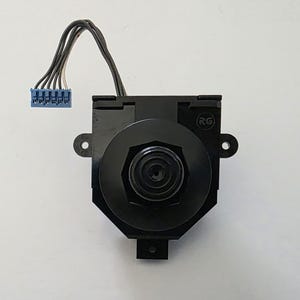 May include: A black electronic component with a circular, hexagonal design in the center. It has a blue connector with multiple pins and several black wires extending from the top. The component is set against a white background.