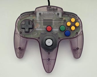 Mando de Nintendo 64 / Morado Atómico / Joystick reacondicionado en perfecto estado / Mando oficial OEM de N64 / Probado y funciona