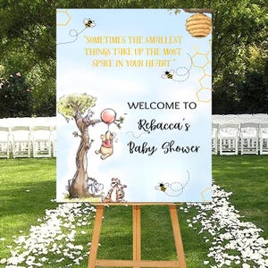 Tabliczka powitalna na baby shower z motywem Kubusia Puchatka: Klasyczny motyw misia