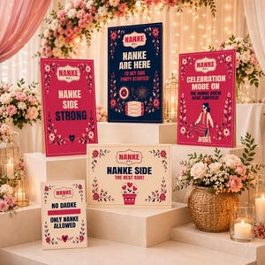 May include: A collection of decorative signs with floral borders and text. The signs are in various sizes and colors, including red, navy, and cream. Text includes "NANKE SIDE STRONG" and "NANKE ARE HERE".