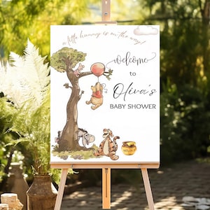 Tabliczka powitalna na baby shower z Kubusiem Puchatkiem: Klasyczny motyw misia