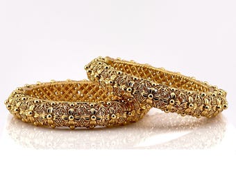 Bangles in Golden Finish with Flower Pattern (Size:2.4)