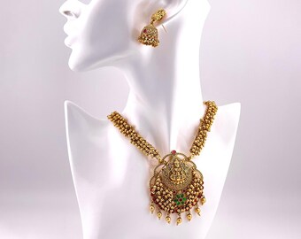 Long Necklace in Antique Golden Finish with Red & Green Kemp Stone