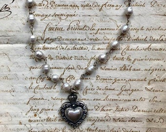 A Lovely Fresh water pearl and silver heart necklace