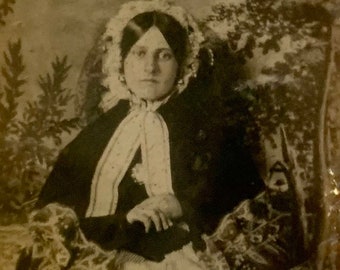 Beautiful Daguerrotype of peaceful woman with quilt