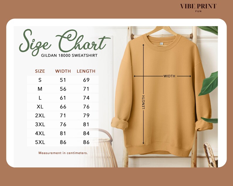 May include: Size chart for a Gildan 18000 sweatshirt, showing measurements in inches for width and length for sizes S through 5XL. The chart is displayed next to a tan sweatshirt.