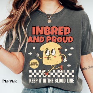 Shirt with funny retro toast image. inbred and proud. keep it in the blood line. incest certified.