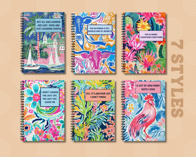May include: Seven different designs of spiral bound notebooks with colorful patterns and humorous text. The text includes phrases like "Not all who wander are lost, some are just avoiding people" and "This is where I overthink everything".