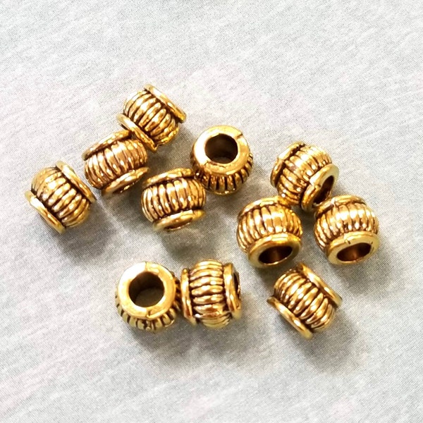 20 Metal Spacer Beads, Antique Gold Ribbed, corrugated Edged 7x5mm Rondelle Spacer beads with an approx. 3.2mm hole Mb9048