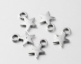 BULK 50 Star charms tibetan silver S14