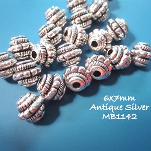 16 Silver Spacer Beads Rope Design Rondelles 6x7mm MB9135