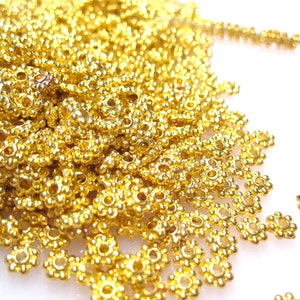 100 Gold 2x4mm Daisy Spacer Beads, Rondelle with an approx. 1mm hole MB1008