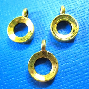 15 Antique Gold Large Hole Bails 13x9x3, 4.5mm inside diameter, concave on both sides. FN9008